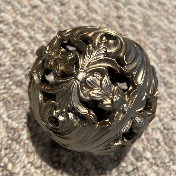 Decorative silver (with gold tinge) metal ball (approx 4.5 inches tall) - Picture 1 of 5